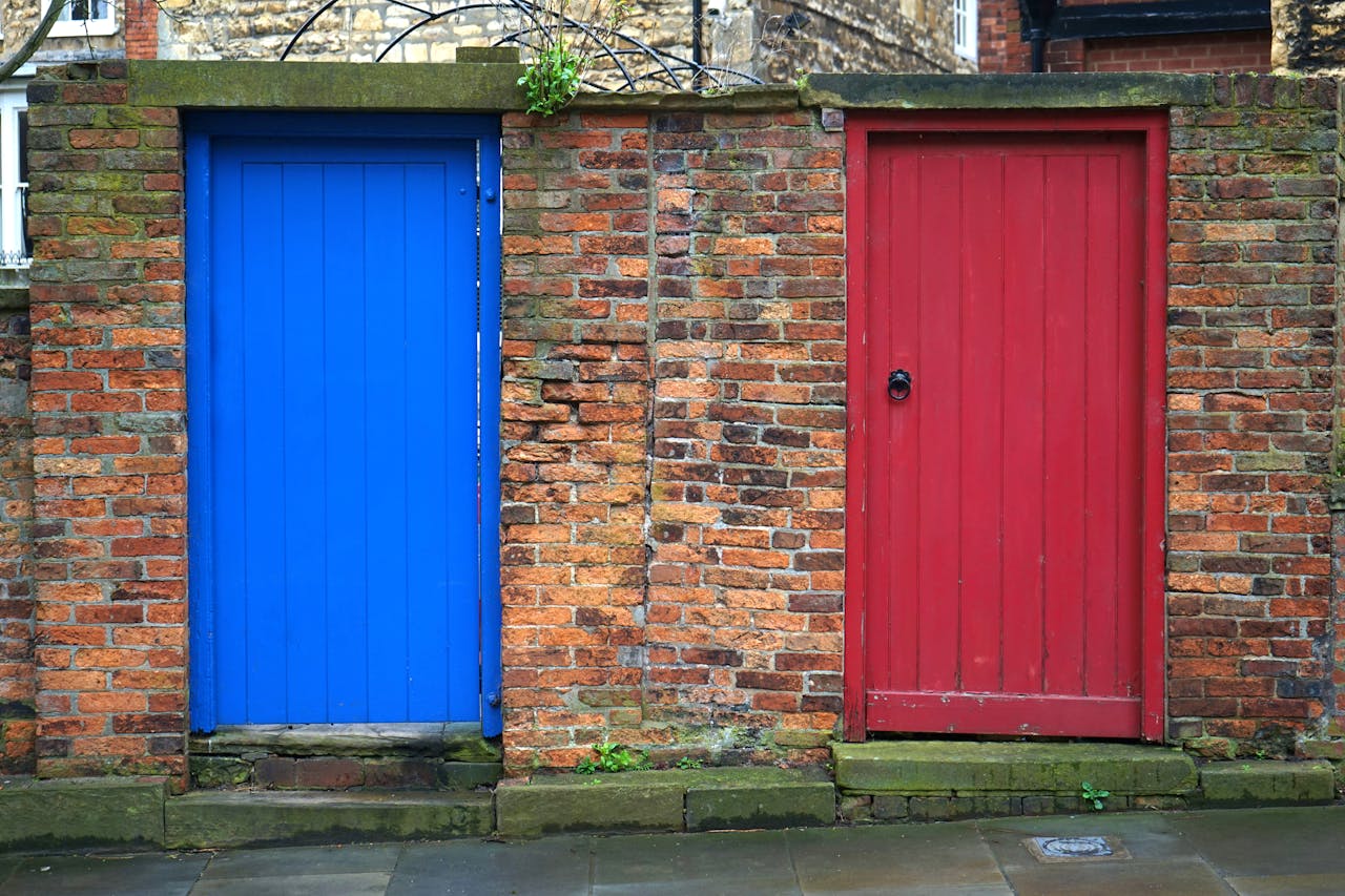 Closed Blue and Red Wooden Doors